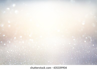 glitter vintage lights background. gold, silver, blue and white. de-focused. - Shutterstock ID 435339904