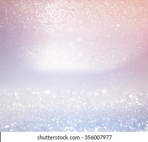 glitter vintage lights background. light silver, and pink. defocused.
