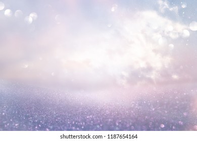 glitter vintage lights background. silver and purple. de-focused