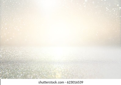 glitter vintage lights background. silver and light gold. de-focused - Shutterstock ID 623016539