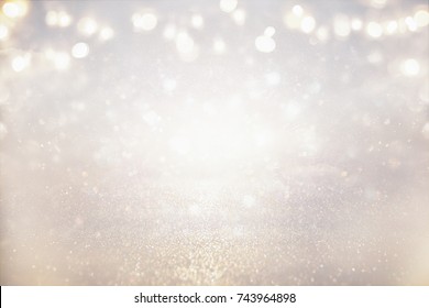 glitter vintage lights background. silver and light gold. de-focused. - Powered by Shutterstock