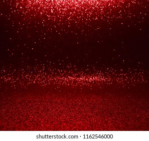 glitter vintage lights texture. red christmas abstract background. defocused