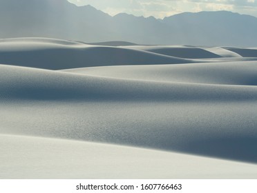 Glittering white sand dunes at White Sands National Park in New Mexico are made primarily of the mineral gypsum, which is rarely found in the form of sand