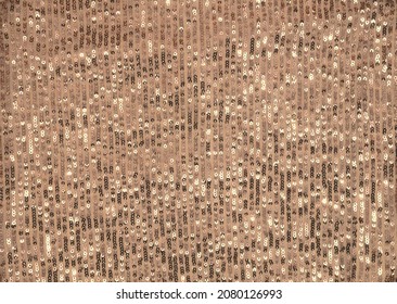 Glittery sparkling festive background - photo of golden sequined fabric.