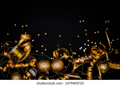 Gllasses Of Champagne On Black Stylish Background With Place For Text. Festive Concept.Golden Stylish Decoration On Black Background.  Sticky Tape, Christmas Balls, Golden Ribbon