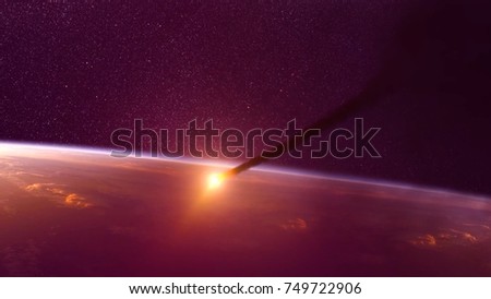 Global accident - collision of an asteroid with the Earth. Meteorite heating up as it fall into the Earth's atmosphere. The heat is caused by friction. Asteroid flies in dark space