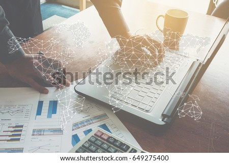 Global business concept: Businessman working with laptop