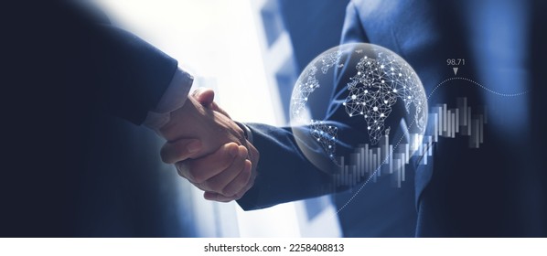 Global business, digital marketing, digital organization and teamwork concept. Successful business partner making handshake with financial graph growth and global internet network technology