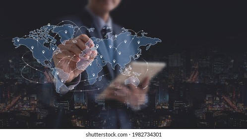 Global business, E-commerce, online marketing concept. Double exposure of businessman using digital tablet touching on virtual screen with world map and pinning on business market place,