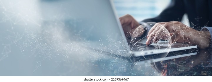 Global business, internet network technology concept. Businessman working on laptop computer with global internet network connection and smart city, digital marketing, data link - Shutterstock ID 2169369467