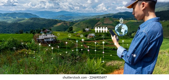 Global communication technology with icon and smartphones, Business young man relax travel with smartphone world communication, Technology in farmer using smart phones connect internet in rice field. - Shutterstock ID 2246905697