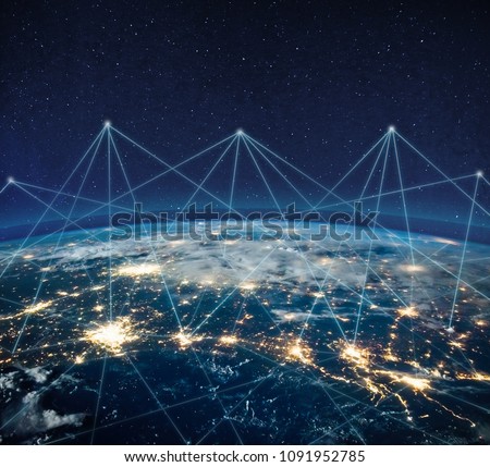 Global communication technology and telecommunication financial network around planet Earth. Blockchain and cryptocurrency concept with copyspace. IOT. Elements of this photo furnished by NASA.