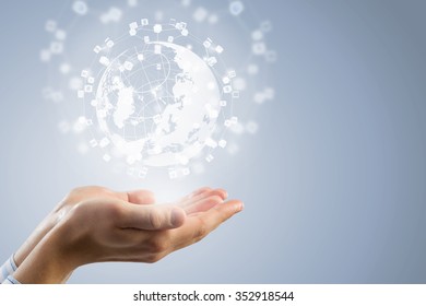 Global connection concept with digital planet in hands