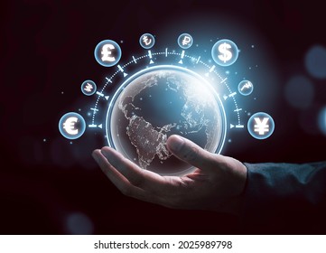 Global currency exchange concept, Businessman holding world with virtual line effect and dollar yuan yen euro and pound sterling sign. - Shutterstock ID 2025989798
