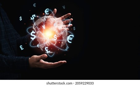 Global currency exchange concept, Trader holding world with virtual line effect and dollar yuan yen euro and pound sterling sign. - Shutterstock ID 2059229033