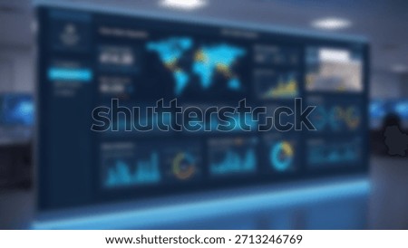 Global Data Analytics Large Display with World Map and Business Charts in Modern Office.