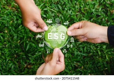 Global ESG icon concept with teamwork. Contribute to saving the environment in a heart shape and in a sustainable business on networking on a green background.