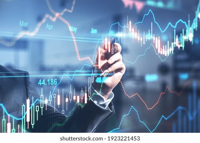 Global Investment Concept With Businessman Touching Digital Screen With Forex Chart Graphs By Pen. Double Exposure