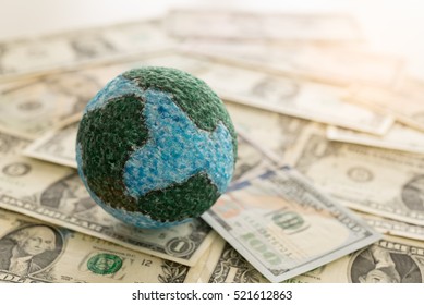 Global Money, Mock Up Globe On Dollar Banknote. Concept Of Foreign Exchange Market, Finance And Banking International.