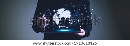 Global network communication connection concept, Man holding digital tablet and pointing finger to graphic hitech earth