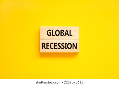 Global recession symbol. Concept words Global recession on wooden blocks. Beautiful yellow table yellow background. Business and global recession concept. Copy space. - Shutterstock ID 2259095615