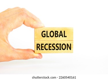 Global recession symbol. Concept words Global recession on wooden blocks. Beautiful white table white background. Businessman hand. Business and global recession concept. Copy space. - Shutterstock ID 2260540161