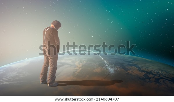Global Warming Concept - A man is standing on\
the Planet Earth surface peeing towards the outher space \