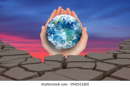 Global Warming Concept- Woman Holding Diamond Globe On Her Hand Withdry Soil  