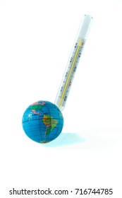 Globe of the earth with a shadow and a thermometer checking her health on a white background.