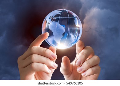 Globe in the hands of a businessman.