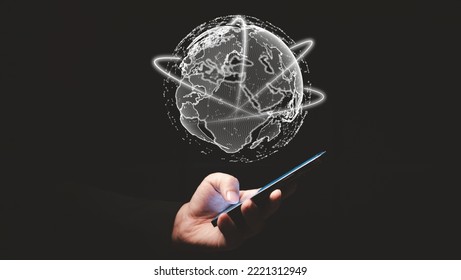 globe and mobile. smartphone show globe hologram. globe connection line and smartphone. hand using smartphone - Powered by Shutterstock - Get 15% off with code: PIKWIZARD15