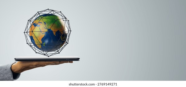 Globe with network frame floating over tablet in minimal clean style on light background, concept of global digital connectivity