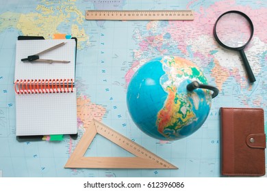Globe on the background of the world map