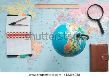 Globe on the background of the world map