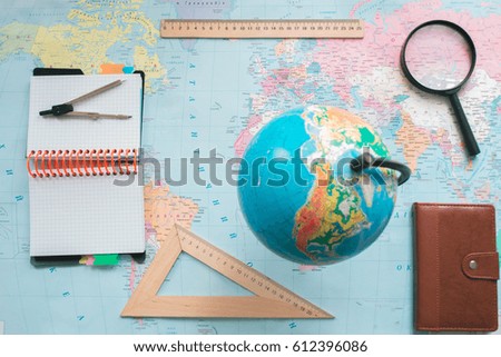 Globe on the background of the world map