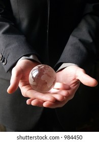 Globe on hands