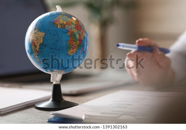 Globe On Office Desk Unrecognizable Business Stock Photo Edit Now