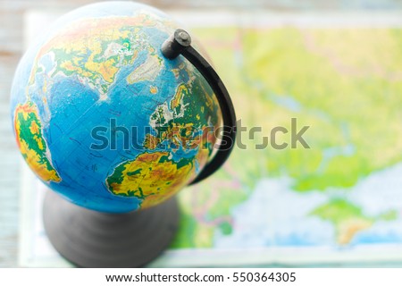 Globe on a table with blurred background