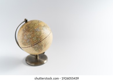 Globes laid out on a white background
