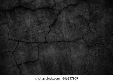 gloomy concrete wall with cracks. destroyed black slab of slab
