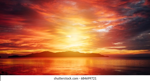 Gloomy tropical sunset,Sunrise sky over Water and Islands,Thailand.
