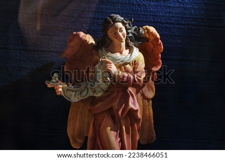 gloria angel wax christmas figurine.