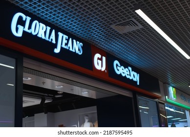 Glory Jeans Clothing Store Sign At The Entrance, Inside The Mall. Smolensk, Russia 03.08.2022.