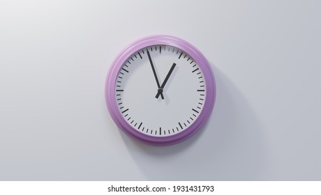 Glossy pink clock on a white wall at fifty-seven past twelve. Time is 00:57 or 12:57