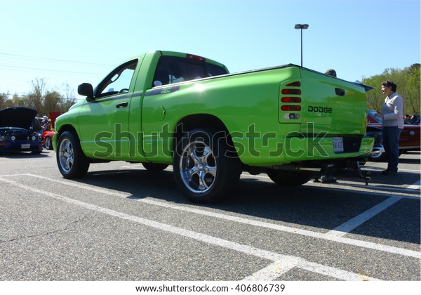 GLOUCESTER,\
VA - April 16, 2016: A lime green Dodge Hemi GTX pickup truck at\
the Daffodil car show, the Daffodil car show is held once each year\
after the Daffodil parade and\
festival.\
\
