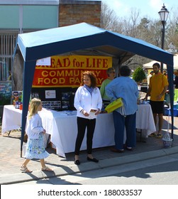 GLOUCESTER, VA - April 5, 2014: 28th Annual Daffodil Parade, Bread For Life Community Food Pantry Vendor After The Parade, The Daffodil Fest And Parade Is A Regular Event Held Each Spring 