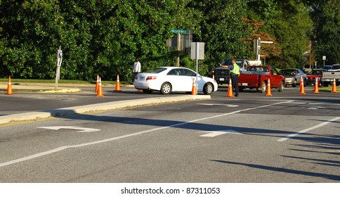 GLOUCESTER, VA, USA - OCTOBER 22: A Deputy Setup To Direct Traffic For The Gloucester High School Homecoming Parade Coming Down Main Street. On October 22, 2011 In Gloucester, VA, USA