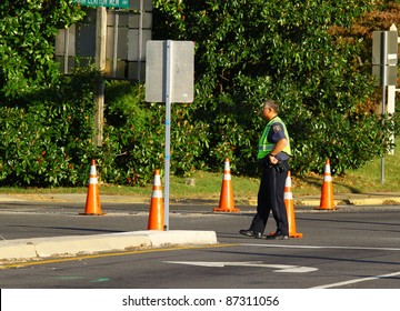 GLOUCESTER, VA, USA - OCTOBER 22: A Deputy Setup To Direct Traffic For The Gloucester High School Homecoming Parade Coming Down Main Street. On October 22, 2011 In Gloucester, VA, USA