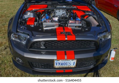 GLOUCESTER, VIRGINIA - NOVEMBER 12, 2016: A Mustang Cobra In The Annual Shop With A Cop Car Show Held Once Each Year To Help Benefit Needy Children Of Gloucester For Christmas. 
