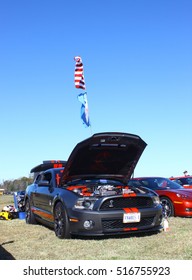 GLOUCESTER, VIRGINIA - NOVEMBER 12, 2016: A Mustang Cobra In The Annual Shop With A Cop Car Show Held Once Each Year To Help Benefit Needy Children Of Gloucester For Christmas. 
